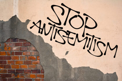 Stop Antisemitism handwritten graffiti sprayed on the wall, an